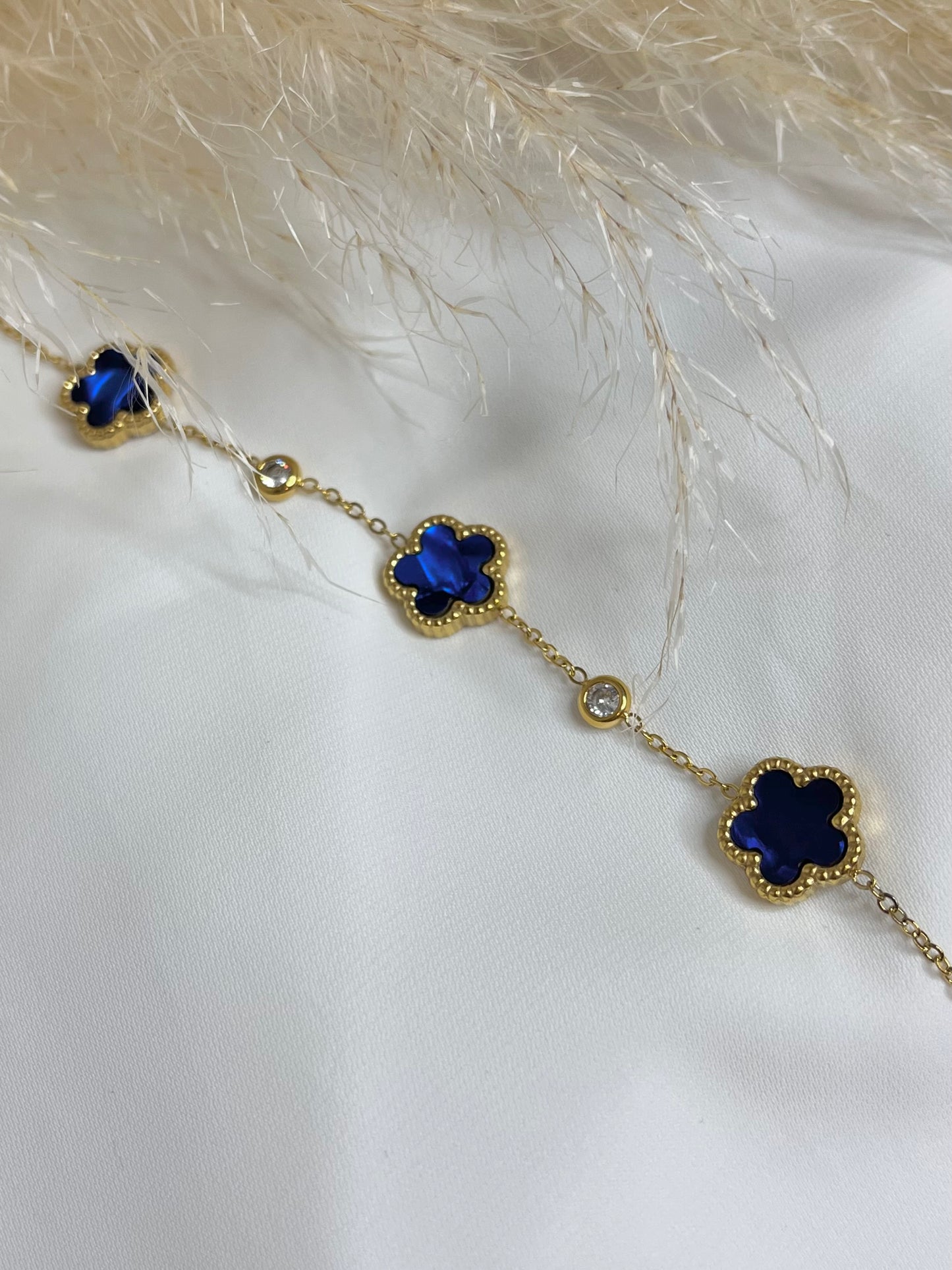 Gourmette trèfle bleu